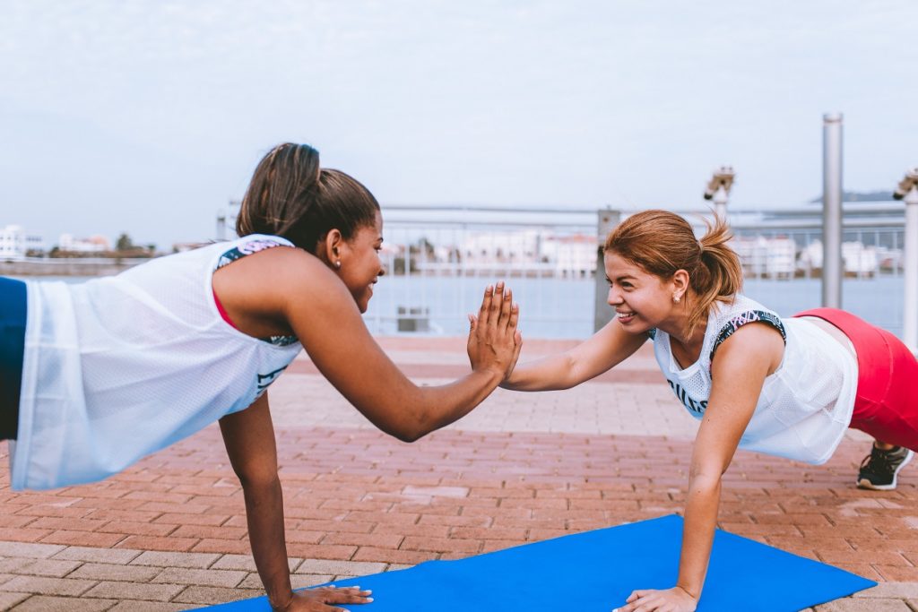 Picture of two women working out together.