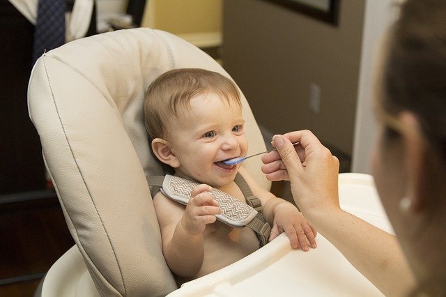 picture of mom feeding baby.